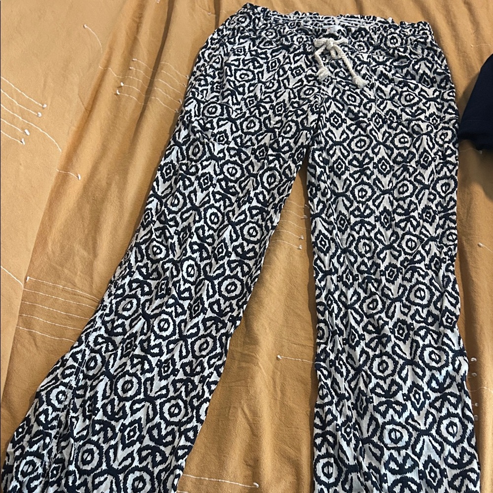 Chic Black and White Geometric Flare Pants